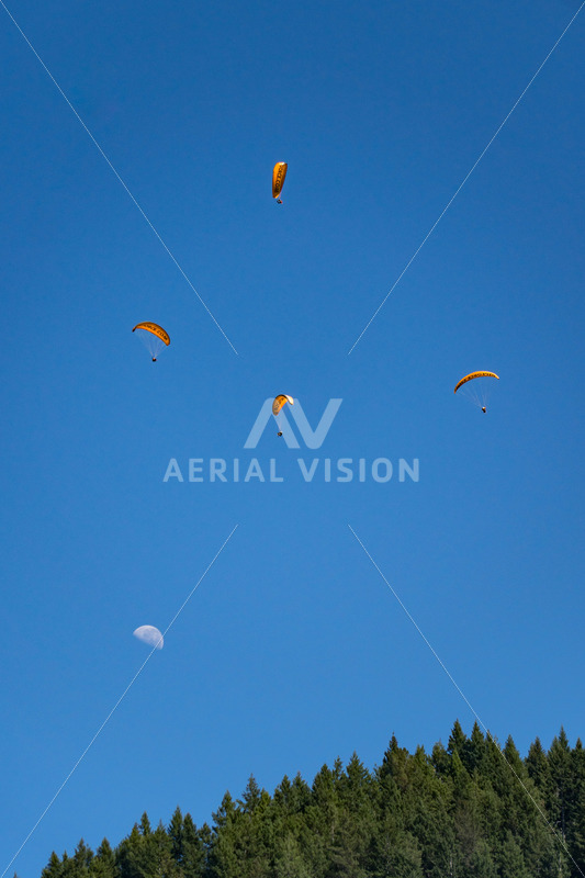 Queenstown Paragliders with moon - Aerial Vision Stock Imagery